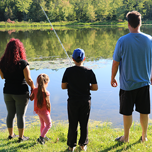 Family fishing at lake whittaker
